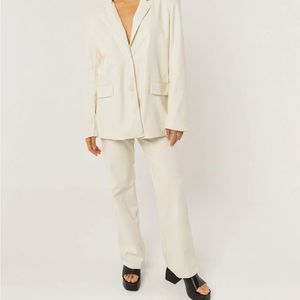 Ivory faux leather snakeskin pants
